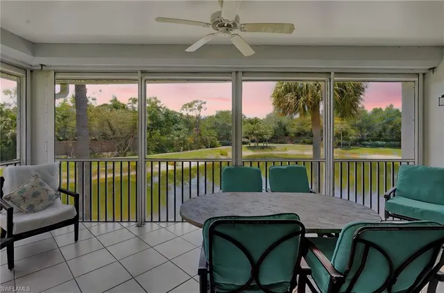 a view of a patio with a table chairs and a table