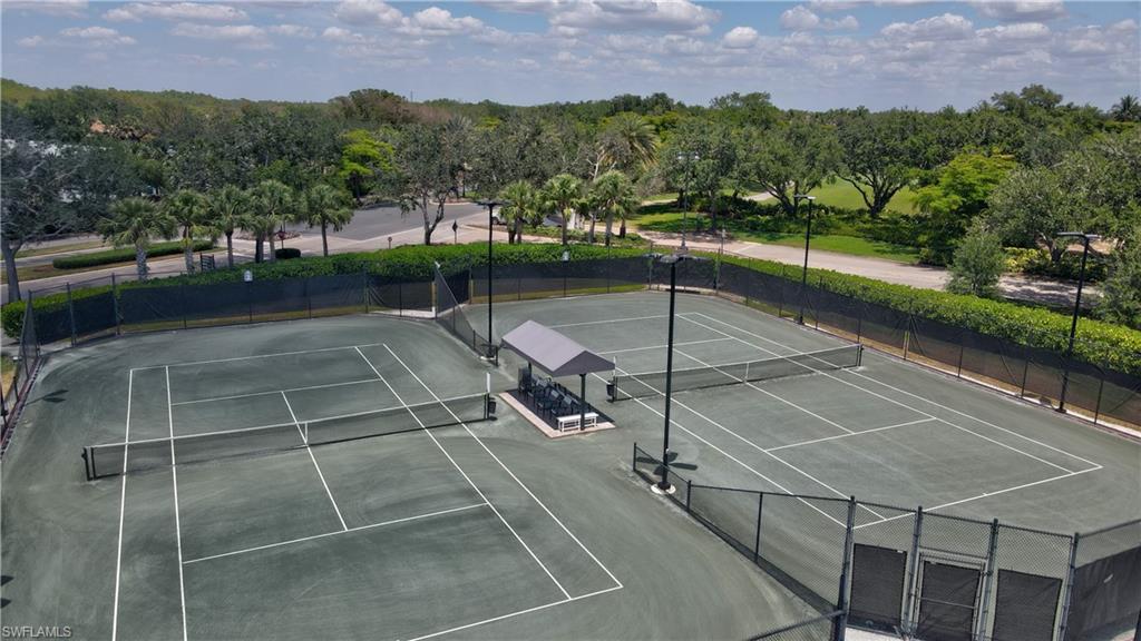 23156 Rosedale Drive, Unit 201 Estero, FL 34135 - Photo 42 of 50 a view of a tennis court