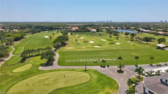 a view of a swimming pool with a city
