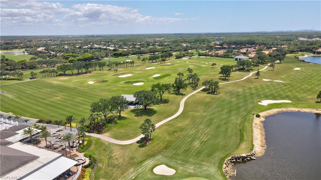 23156 Rosedale Drive, Unit 201 Estero, FL 34135 - Photo 46 of 50 an aerial view of residential houses with outdoor space