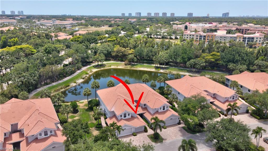 23156 Rosedale Drive, Unit 201 Estero, FL 34135 - Photo 50 of 50 an aerial view of residential houses with outdoor space and swimming pool