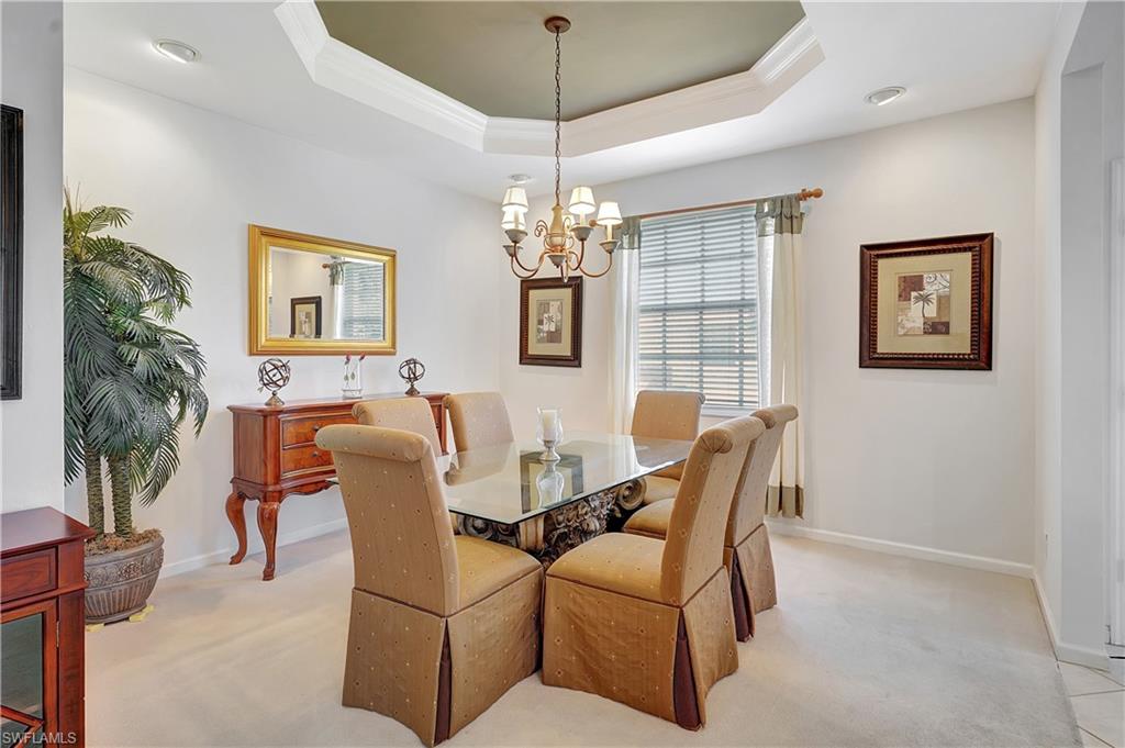 23156 Rosedale Drive, Unit 201 Estero, FL 34135 - Photo 5 of 50 a dining room with furniture and window