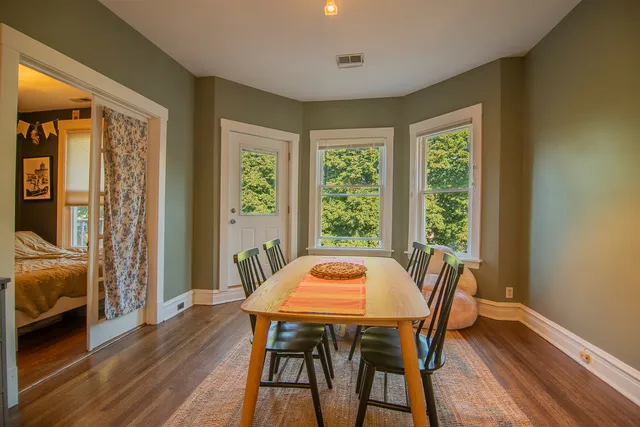 a bedroom with a bed and a closet