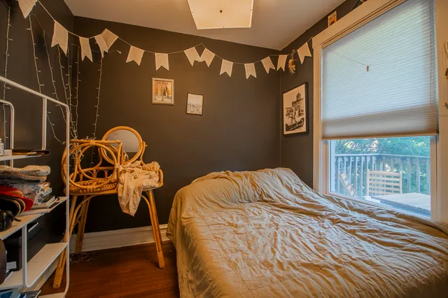 a bedroom with a bed and a closet