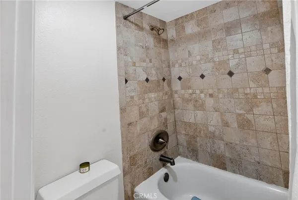 a bathroom with a double vanity sink and mirror