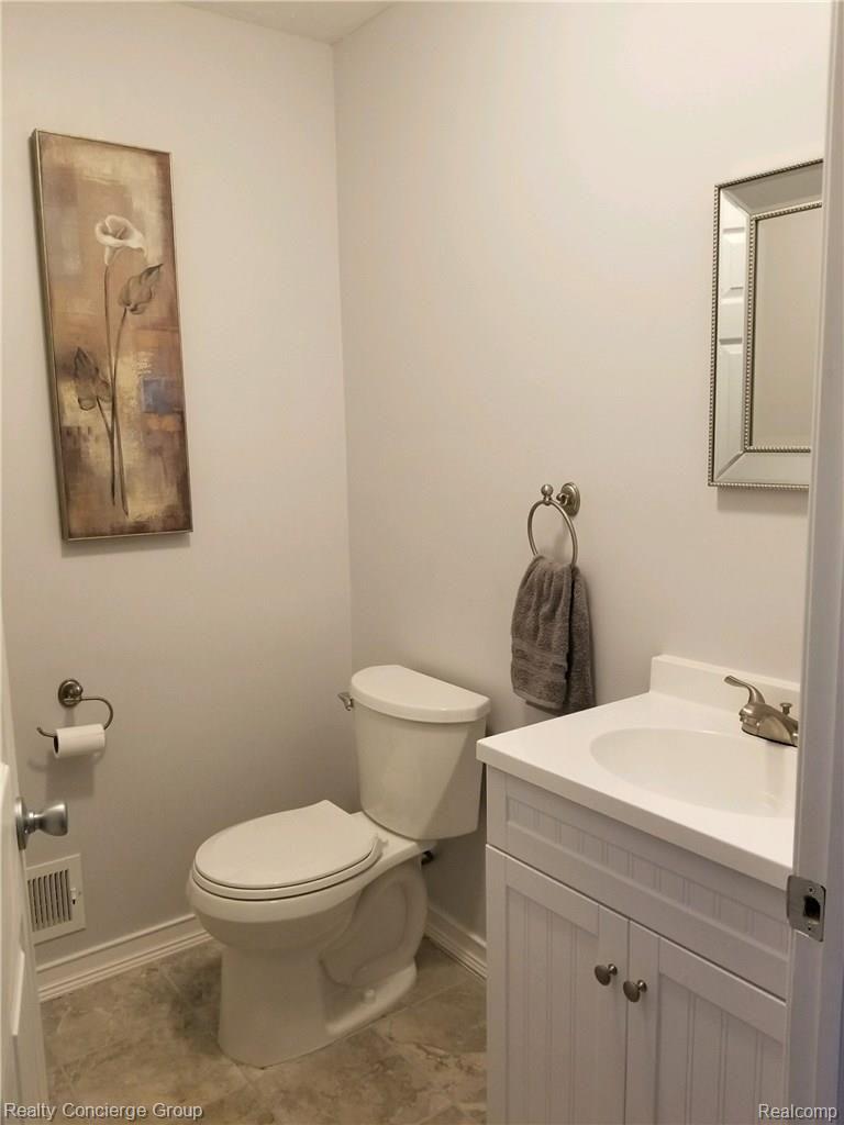 3345 South Latson Road Howell, MI 48843 - Photo 15 of 38 Brand New 1/2 Bath just off of the Kitchen