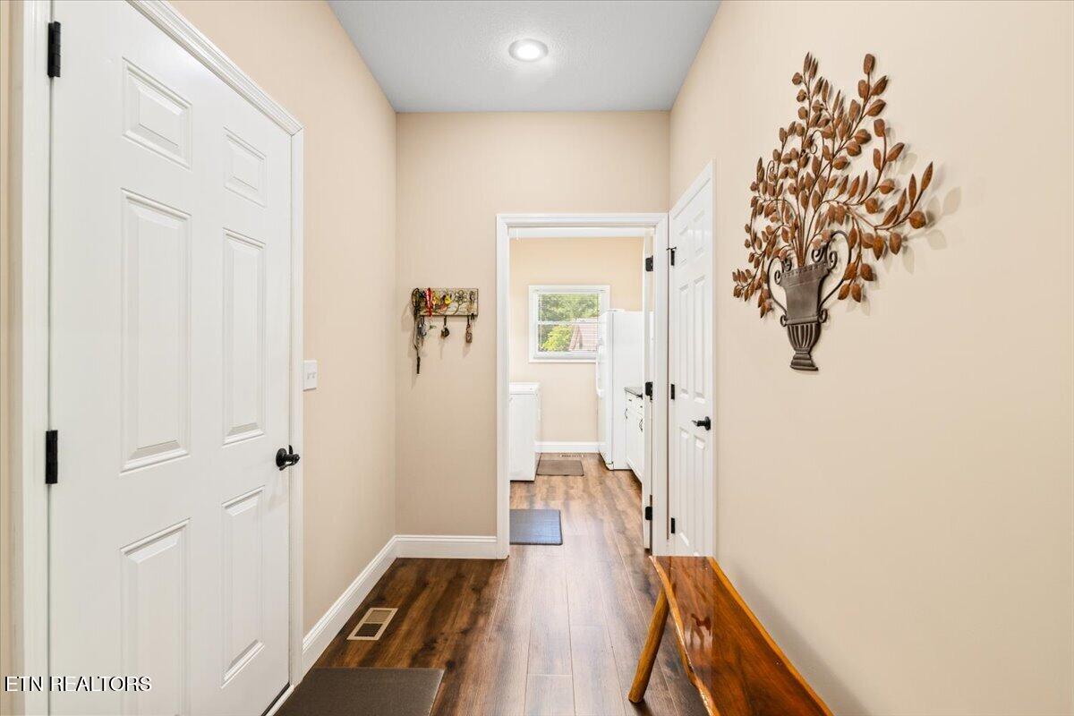 1380 East Norris Point Road La Follette, TN 37766 - Photo 33 of 54 Hall to Garage and Laundry Room