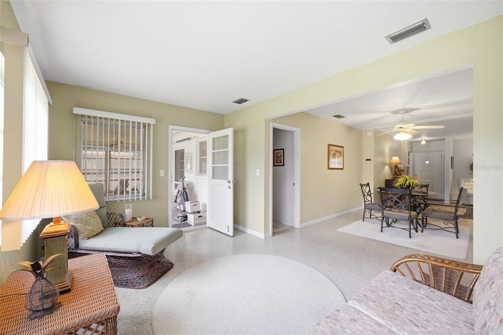 1830 South Mandarin Terrace Inverness, FL 34450 - Photo 11 of 47 a bedroom with furniture and a large window