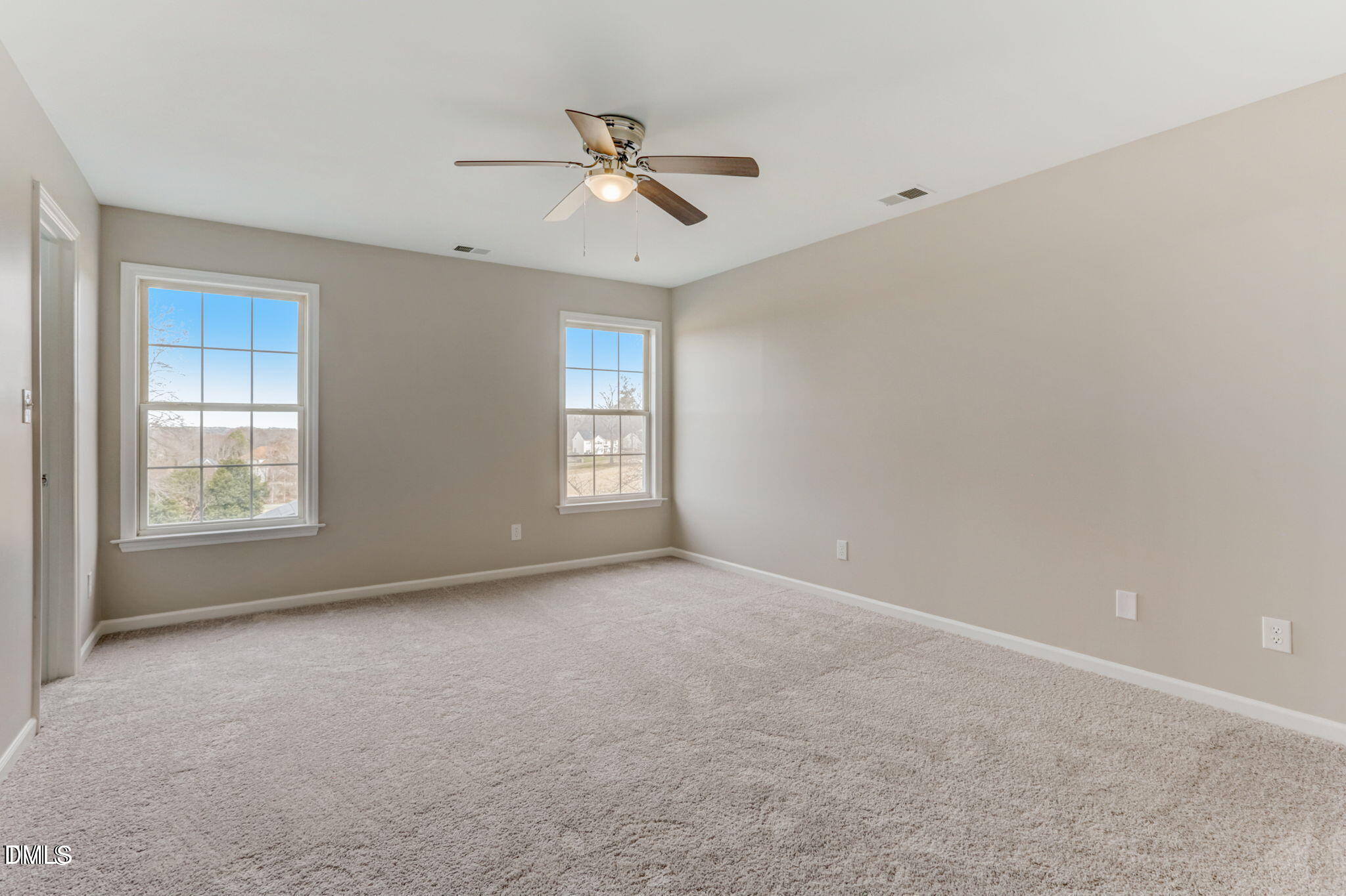 480 Seastone Street Raleigh, NC 27603 - Photo 17 of 26 a view of an empty room with a window