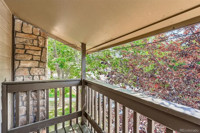 a view of a porch and a yard