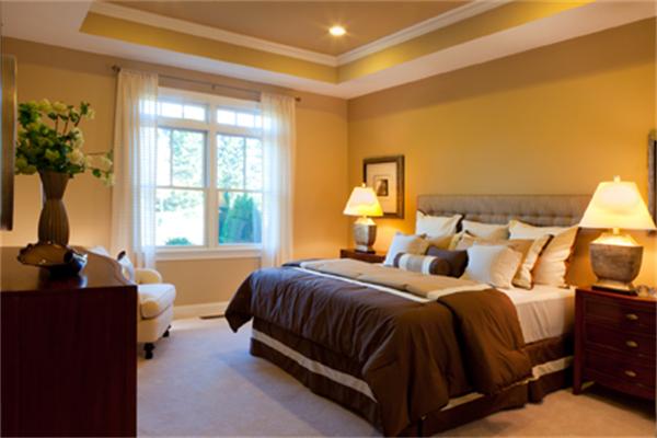 49 South Cottage Road, Unit 111 Belmont, MA 02478 - Photo 3 of 3 a bedroom with a bed and a couch