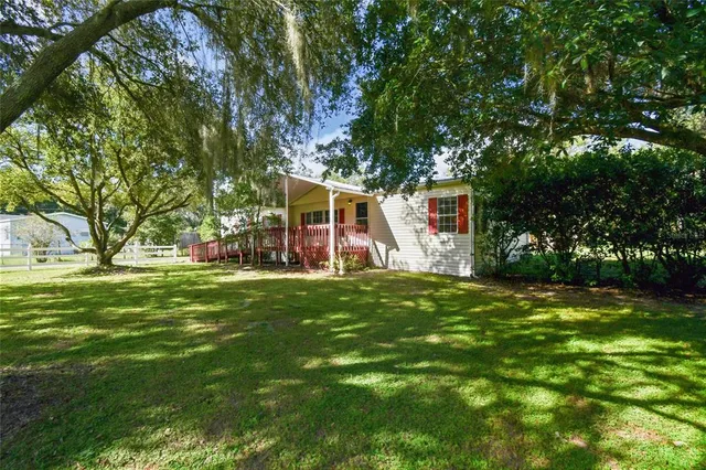 a bedroom with bed and a window