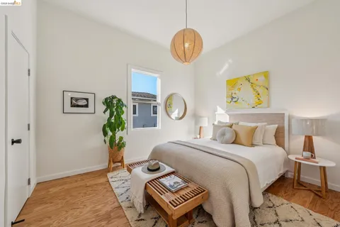 a bedroom with bed and a window