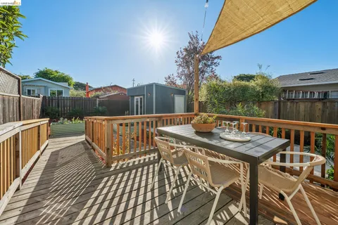 a view of a balcony with furniture