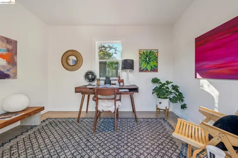 a view of a workspace with furniture