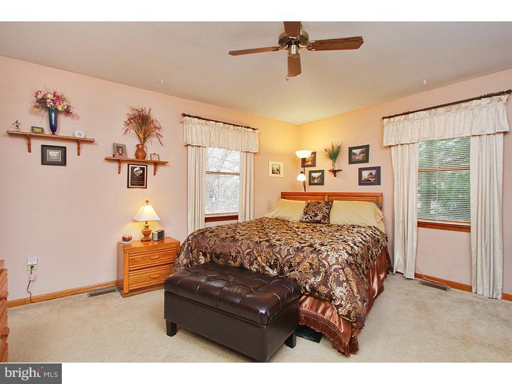 739 Rattling Run Road Mickleton, NJ 08056 - Photo 8 of 19 a bedroom with a bed and window