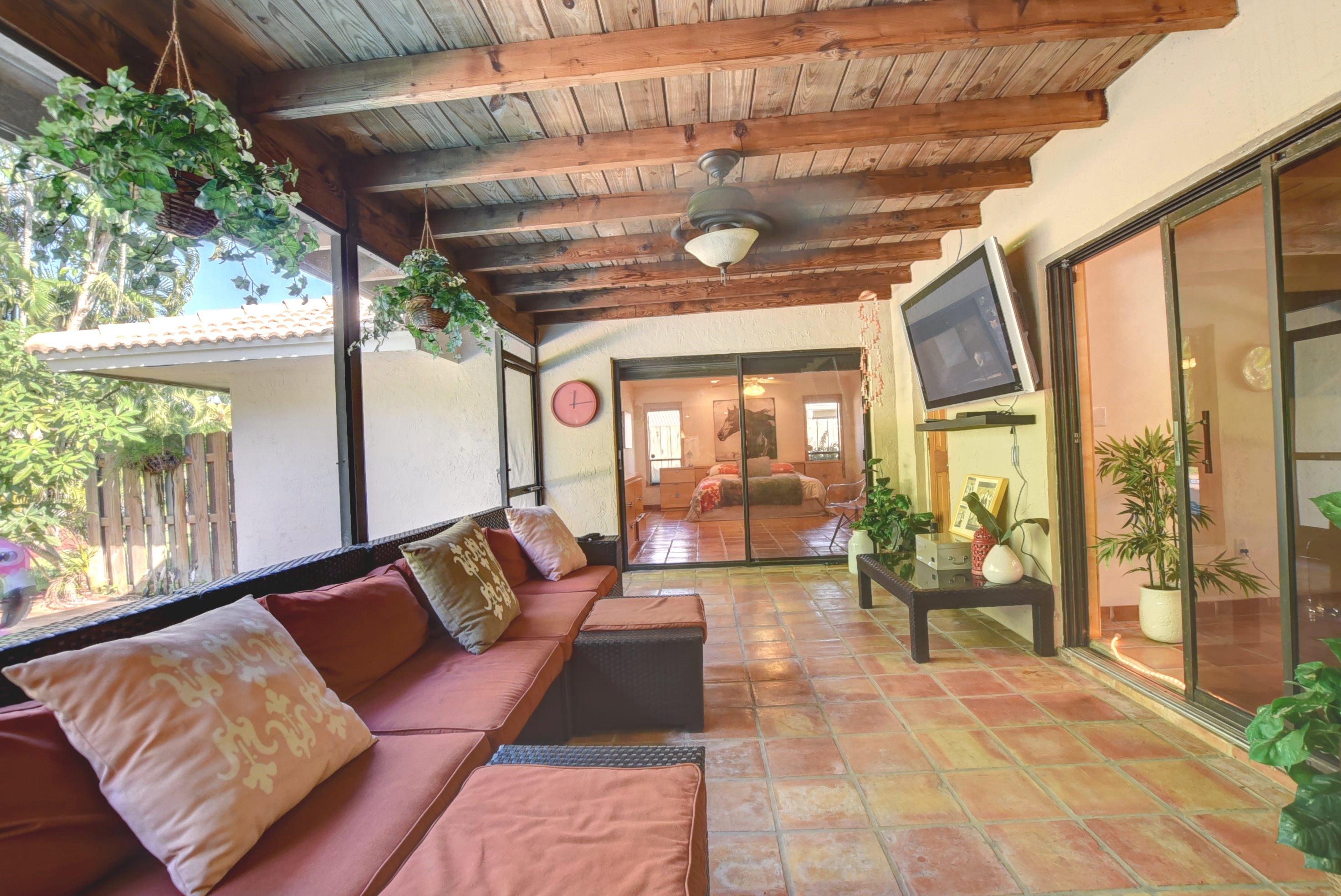 6761 Entrada Place Boca Raton, FL 33433 - Photo 55 of 69 a living room with furniture and a large window