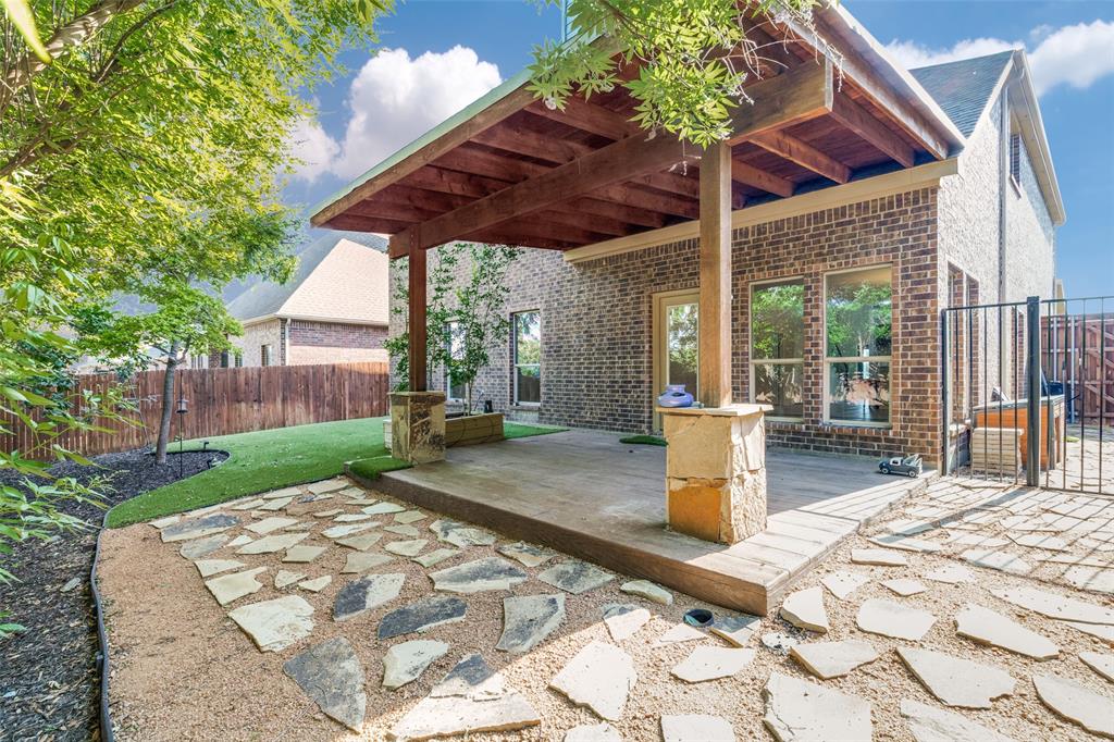 809 Sawmill Road McKinney, TX 75072 - Photo 13 of 13 Backyard Patio and turf yard