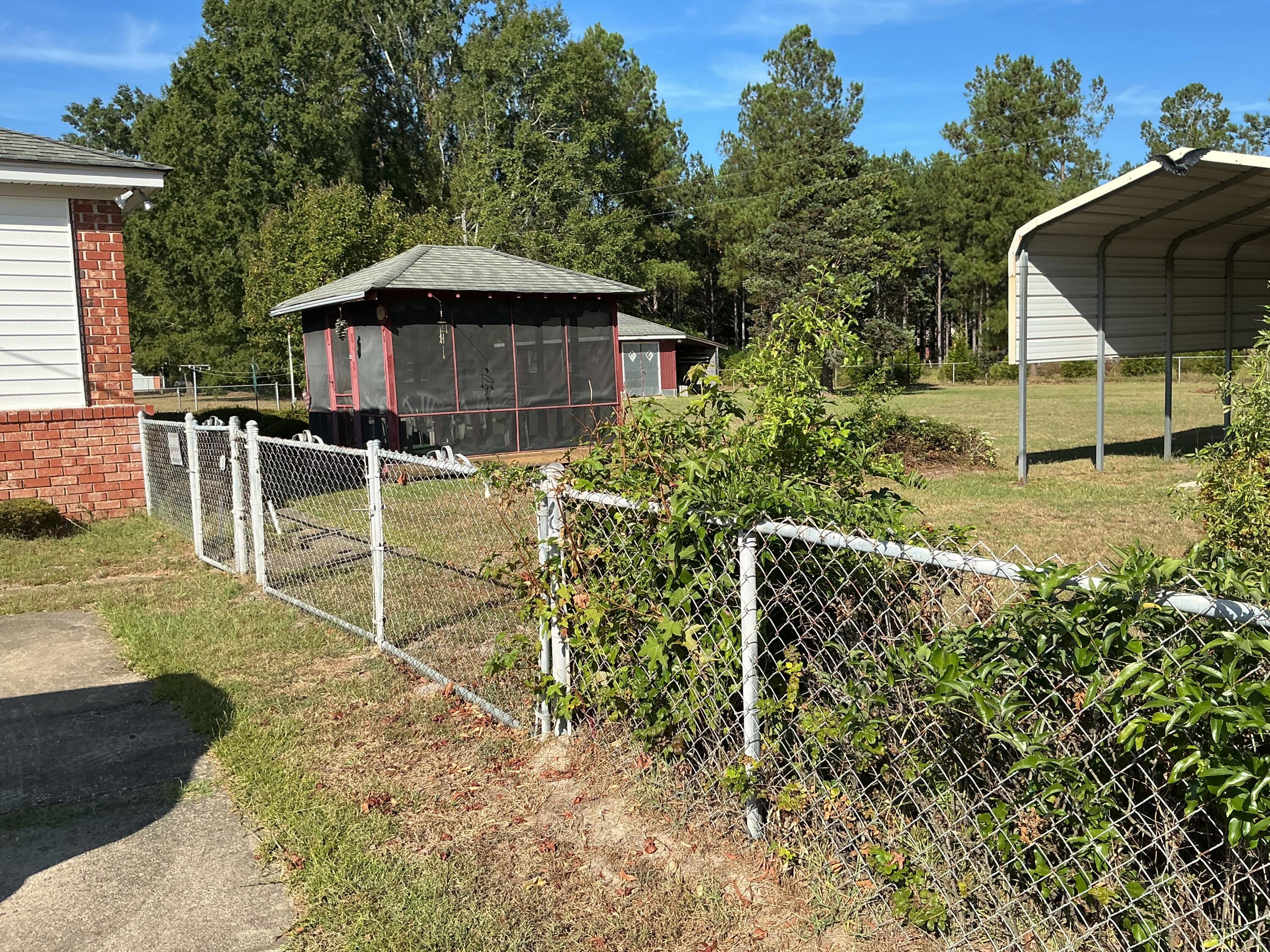 1385 Jefferson Road Sumter, SC 29153 - Photo 3 of 30 Backyard is fenced in