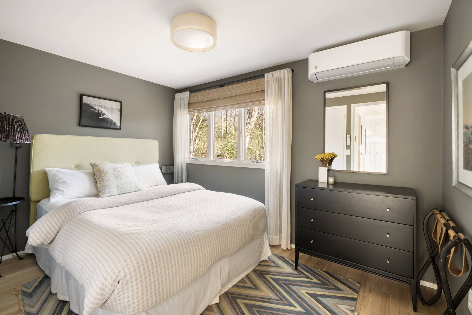 33 Robins Way East Hampton, NY 11937 - Photo 14 of 18 a bedroom with a bed and a window