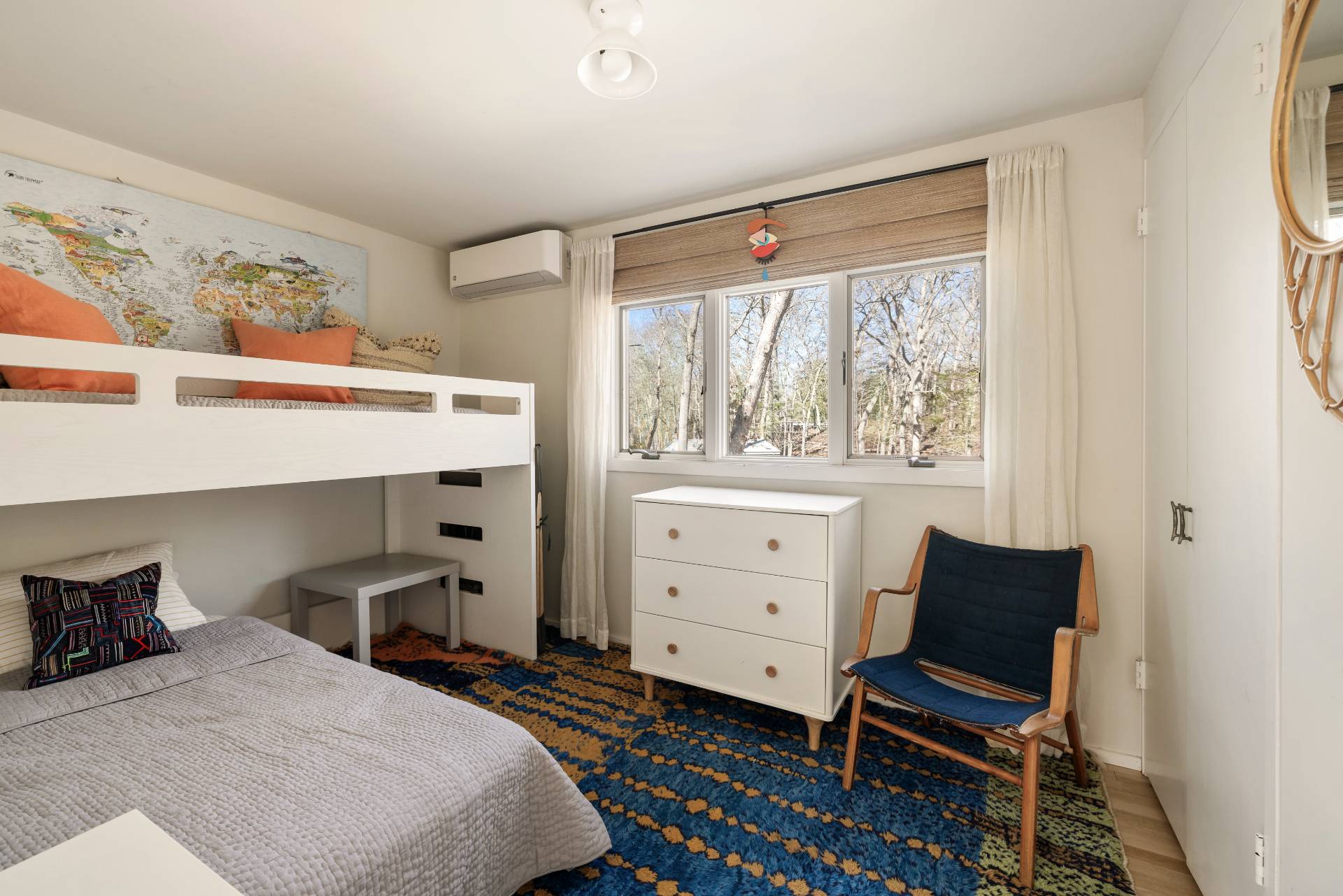 33 Robins Way East Hampton, NY 11937 - Photo 15 of 18 a bedroom with a bed and a window