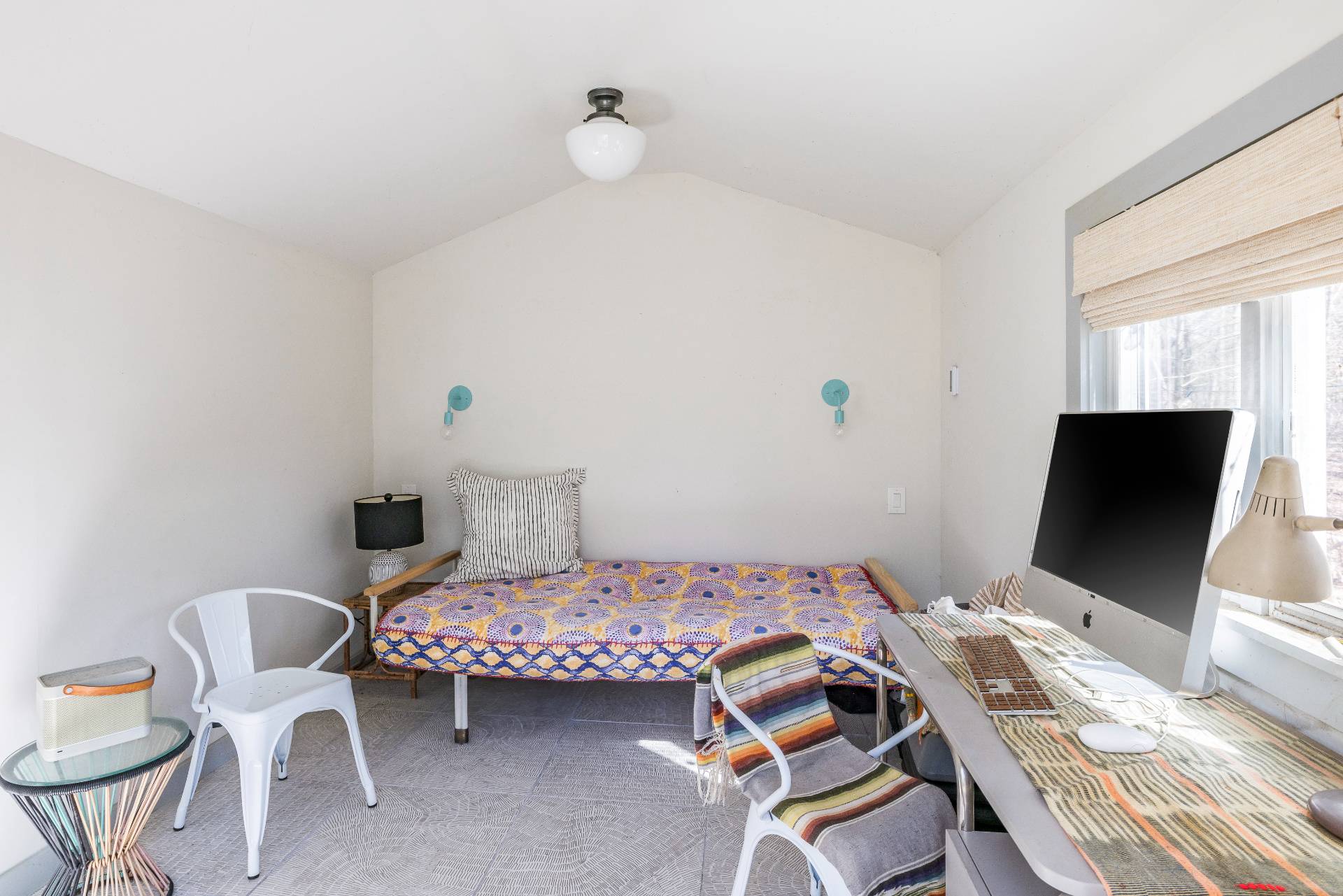 33 Robins Way East Hampton, NY 11937 - Photo 18 of 18 a bedroom with a bed and a flat screen tv