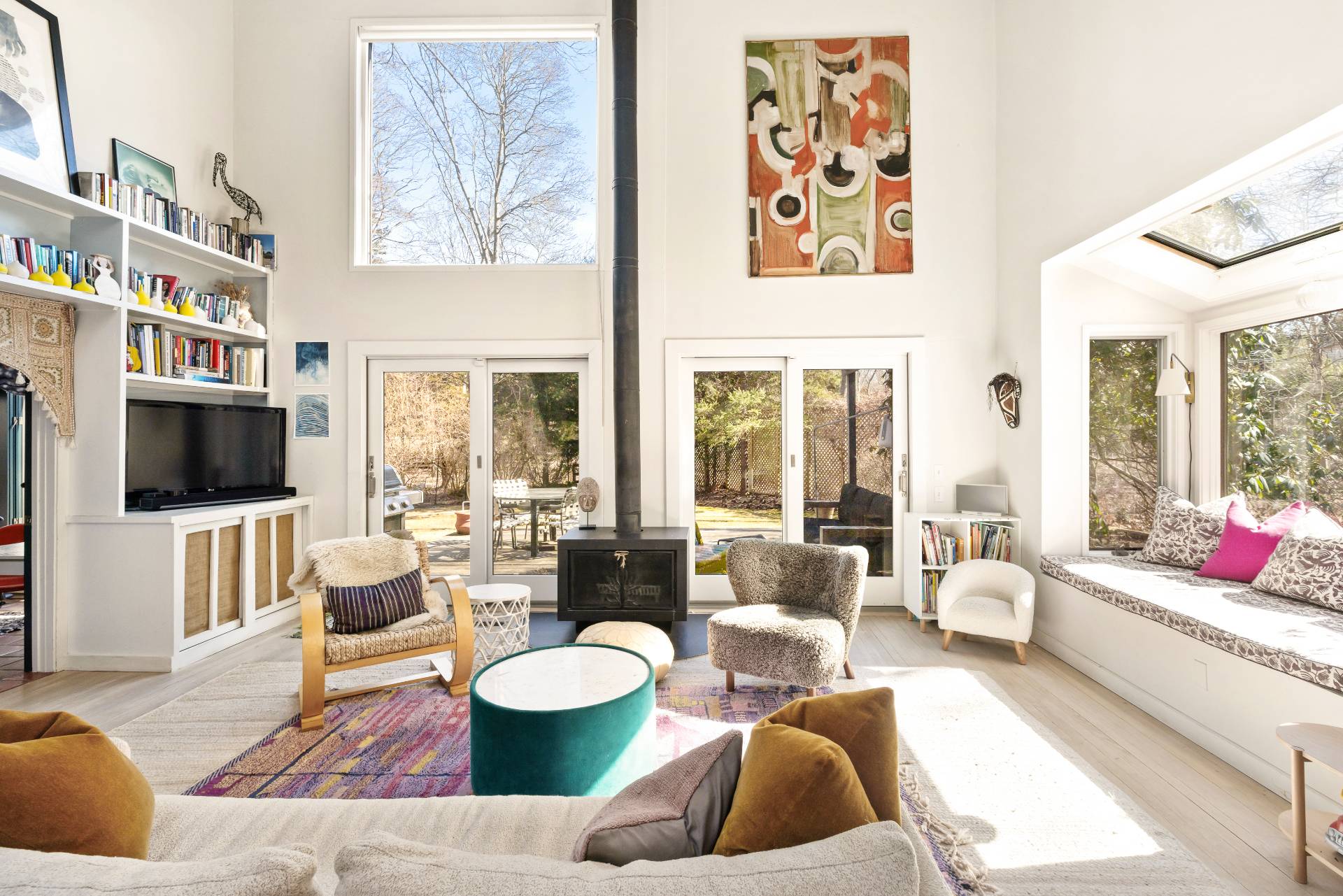 33 Robins Way East Hampton, NY 11937 - Photo 6 of 18 a living room with furniture large window and flat screen tv