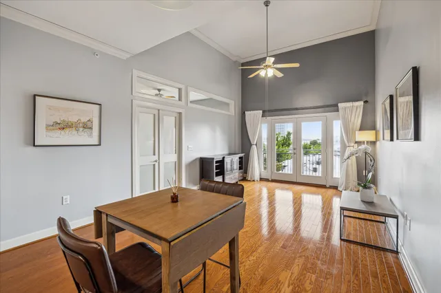 a view of a dining room with furniture window and wooden floor