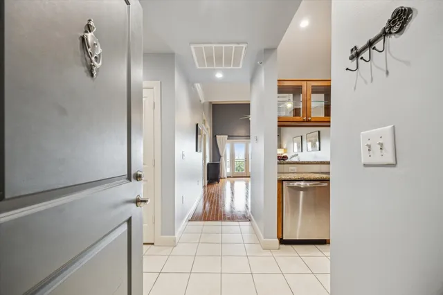 a view of a hallway with some storage area