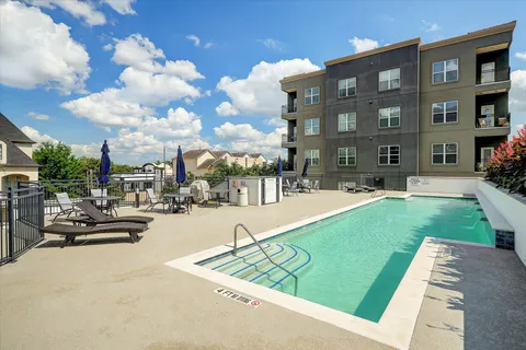 a view of a building and a yard