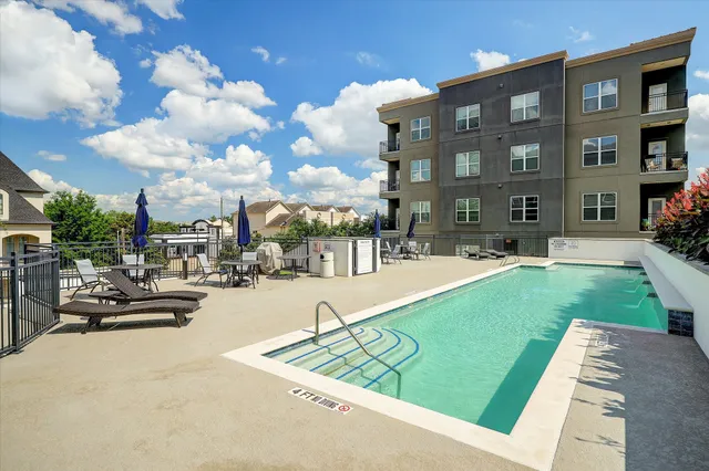 a view of a building and a yard