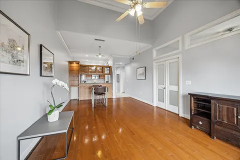 a view of a dining room with furniture and wooden floor