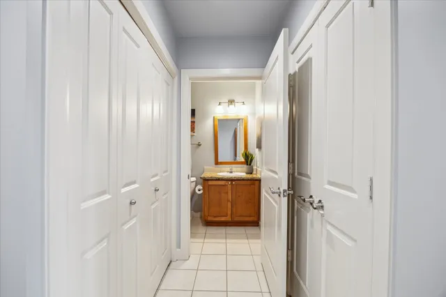 a bathroom with a mirror and a sink