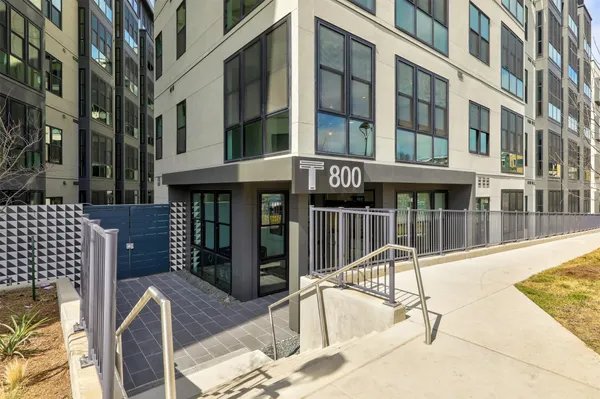 a building outdoor space with patio furniture