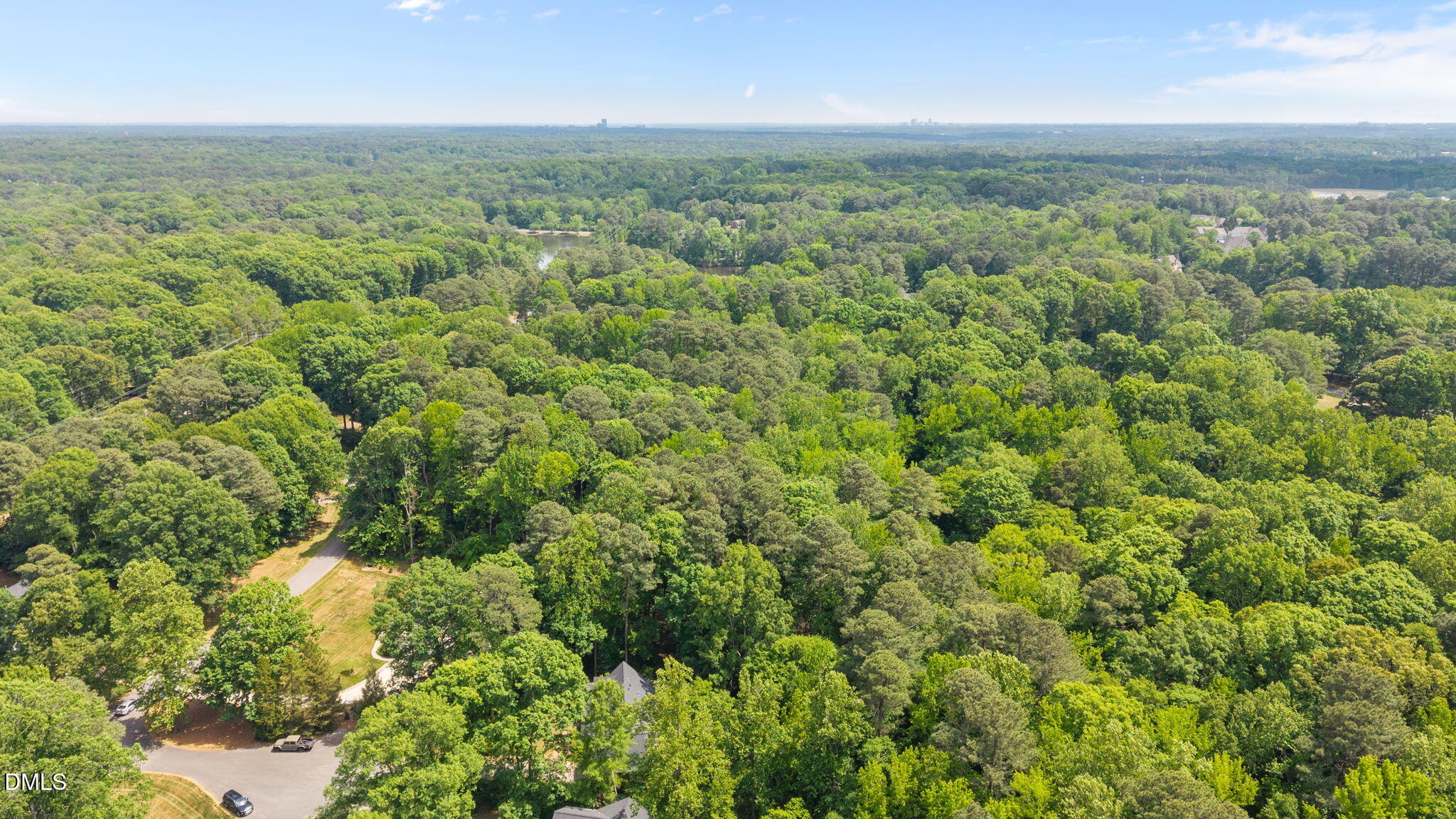 8705 Trailing Cedar Court Raleigh, NC 27613 - Photo 6 of 46 8-web-or-mls-DJI_20260424143651_0533_D