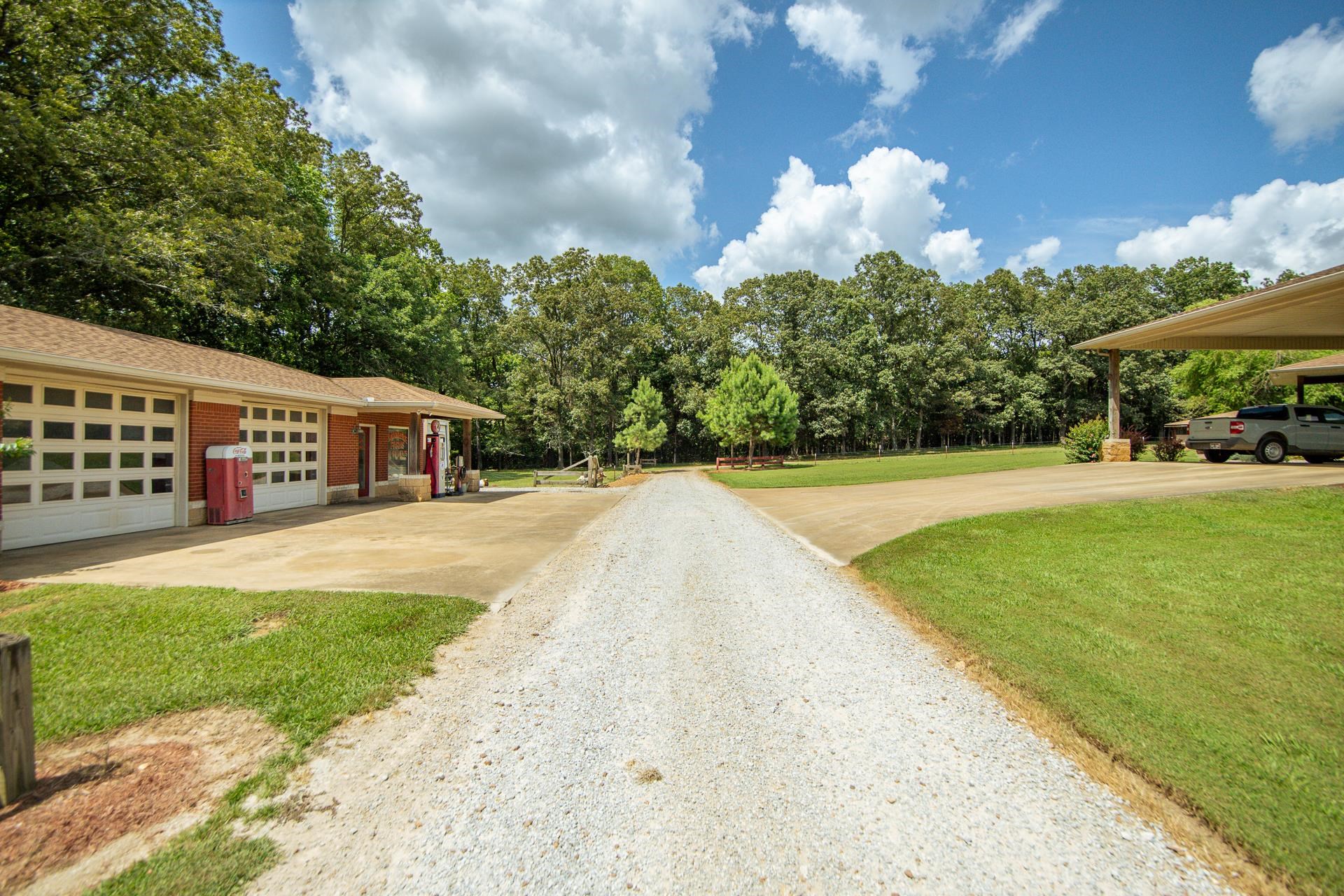 2690 Fellowship Road Sardis, TN 38371 - Photo 40 of 40 a front view of a house with a yard and trees