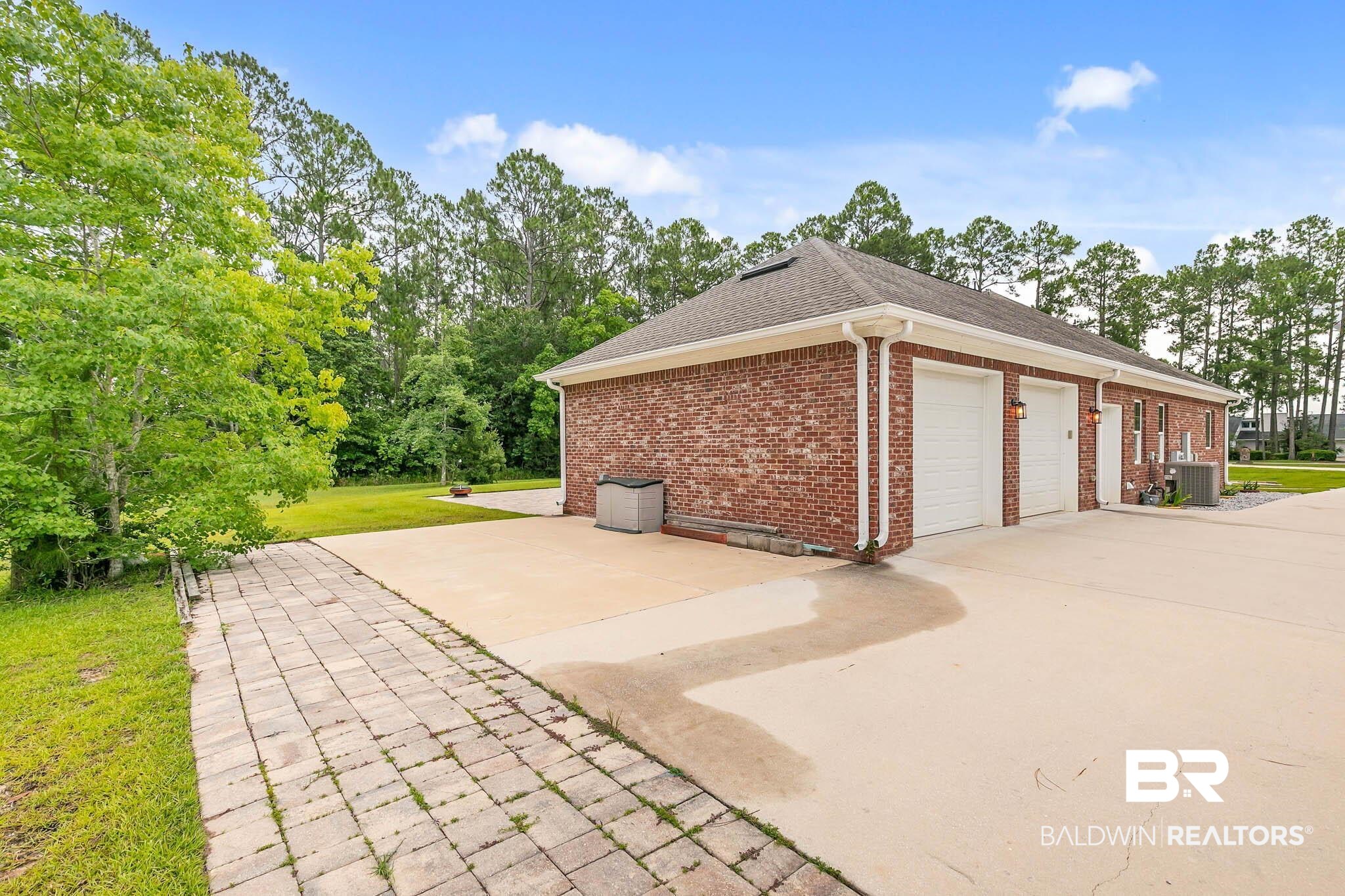 8145 Bay View Drive Foley, AL 36535 - Photo 60 of 81 Garage with driveway