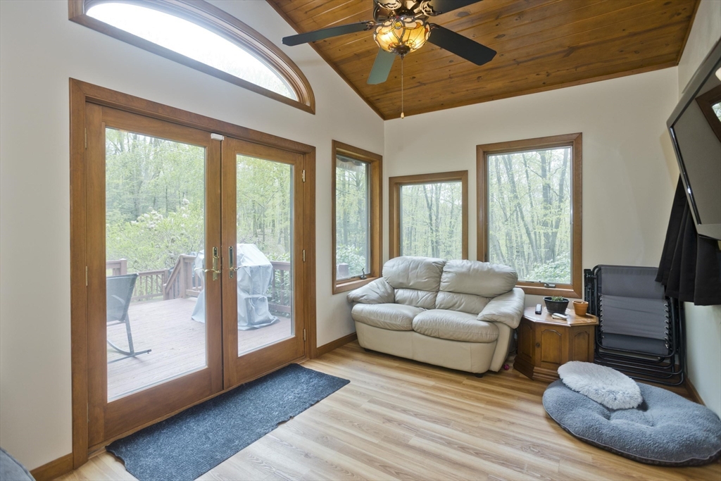 32 Zuell Hill Road Monson, MA 01057 - Photo 13 of 37 a living room with furniture and a large window