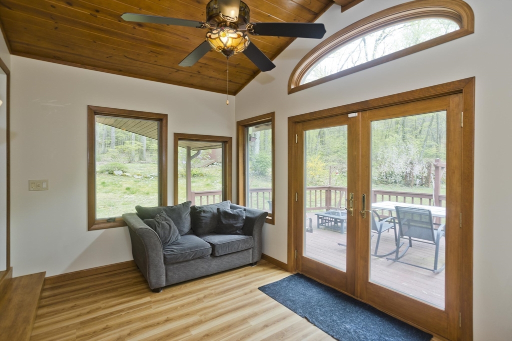 32 Zuell Hill Road Monson, MA 01057 - Photo 14 of 37 a living room with furniture and a large window