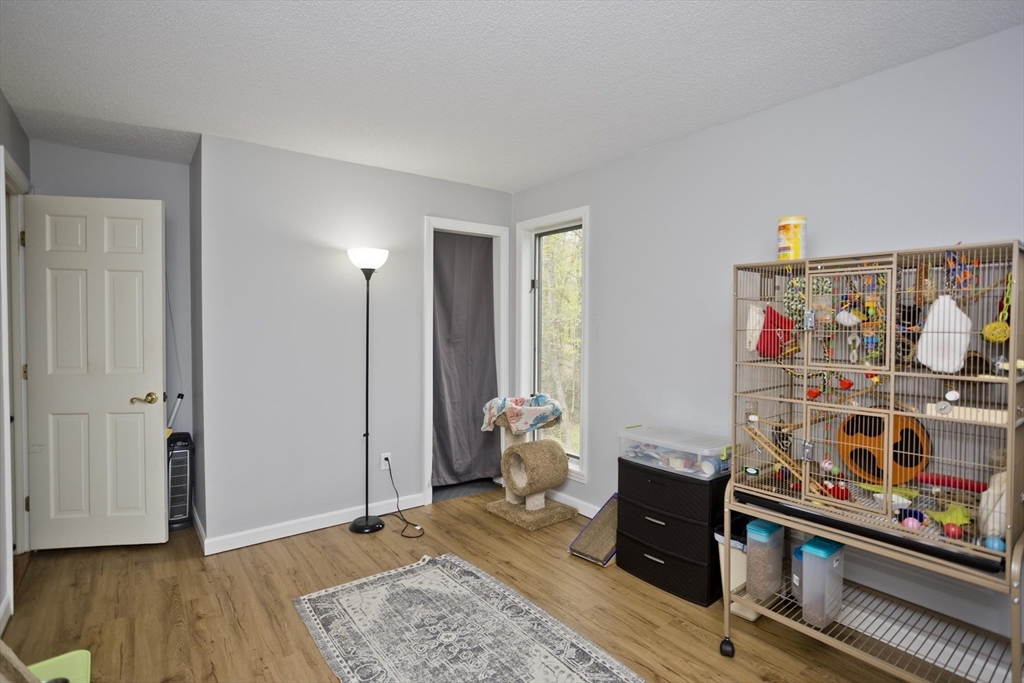 32 Zuell Hill Road Monson, MA 01057 - Photo 23 of 37 a view of a livingroom with furniture and toys