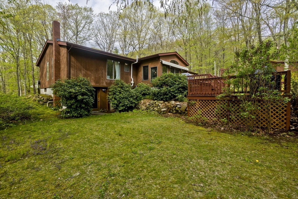 32 Zuell Hill Road Monson, MA 01057 - Photo 32 of 37 a house that has a tree in it