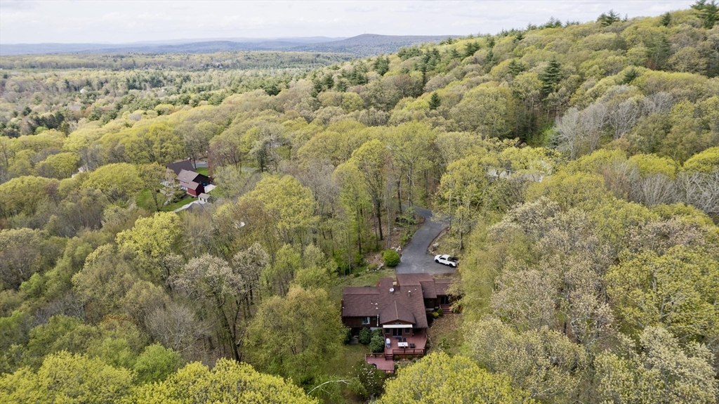 32 Zuell Hill Road Monson, MA 01057 - Photo 35 of 37 an aerial view of a house with a yard