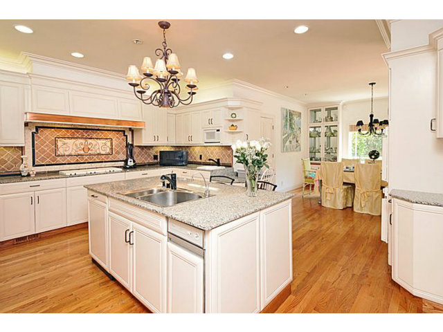 430 Fulton Road San Mateo, CA 94402 - Photo 12 of 25 a open kitchen with a sink stove and wooden floor