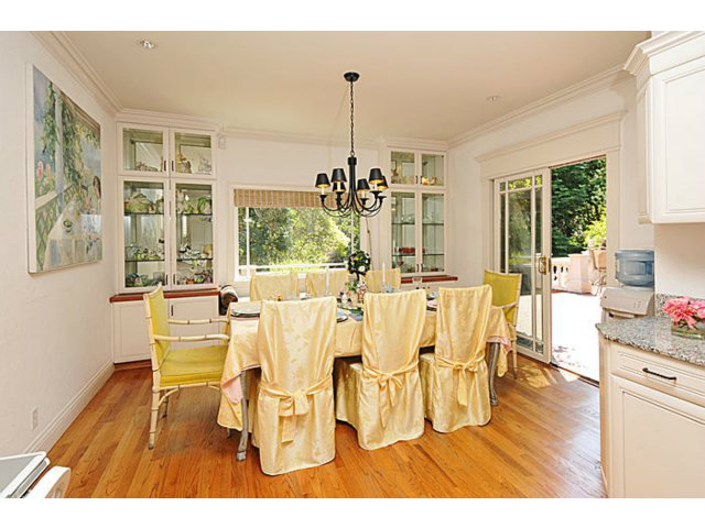 430 Fulton Road San Mateo, CA 94402 - Photo 14 of 25 a view of a dining room with furniture window and wooden floor