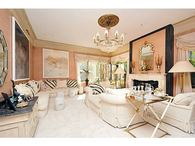 430 Fulton Road San Mateo, CA 94402 - Photo 8 of 25 a view of a dining room with furniture a chandelier and large windows