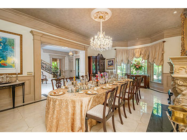 430 Fulton Road San Mateo, CA 94402 - Photo 10 of 25 a view of a dining room with furniture and a chandelier