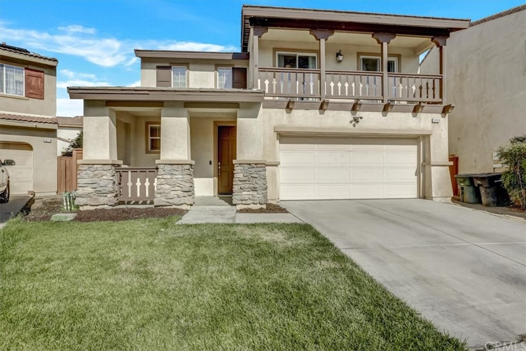 3908 Manquelo Court Perris, CA 92571 - Photo 1 of 1 a front view of a house with a yard