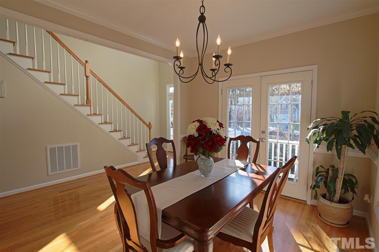 4 Providence Ridge Road Durham, NC 27713 - Photo 5 of 25 a view of a dining room with furniture window and wooden floor