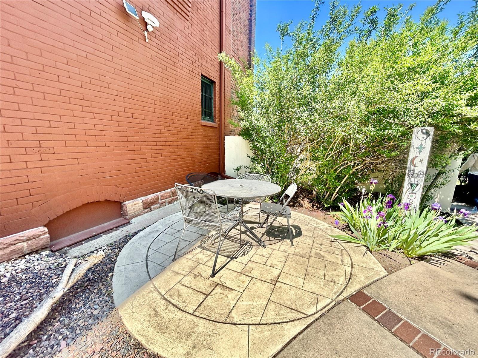 16-th 16-th E 16th Denver, CO 80203 - Photo 34 of 38 a view of a swimming pool with chairs