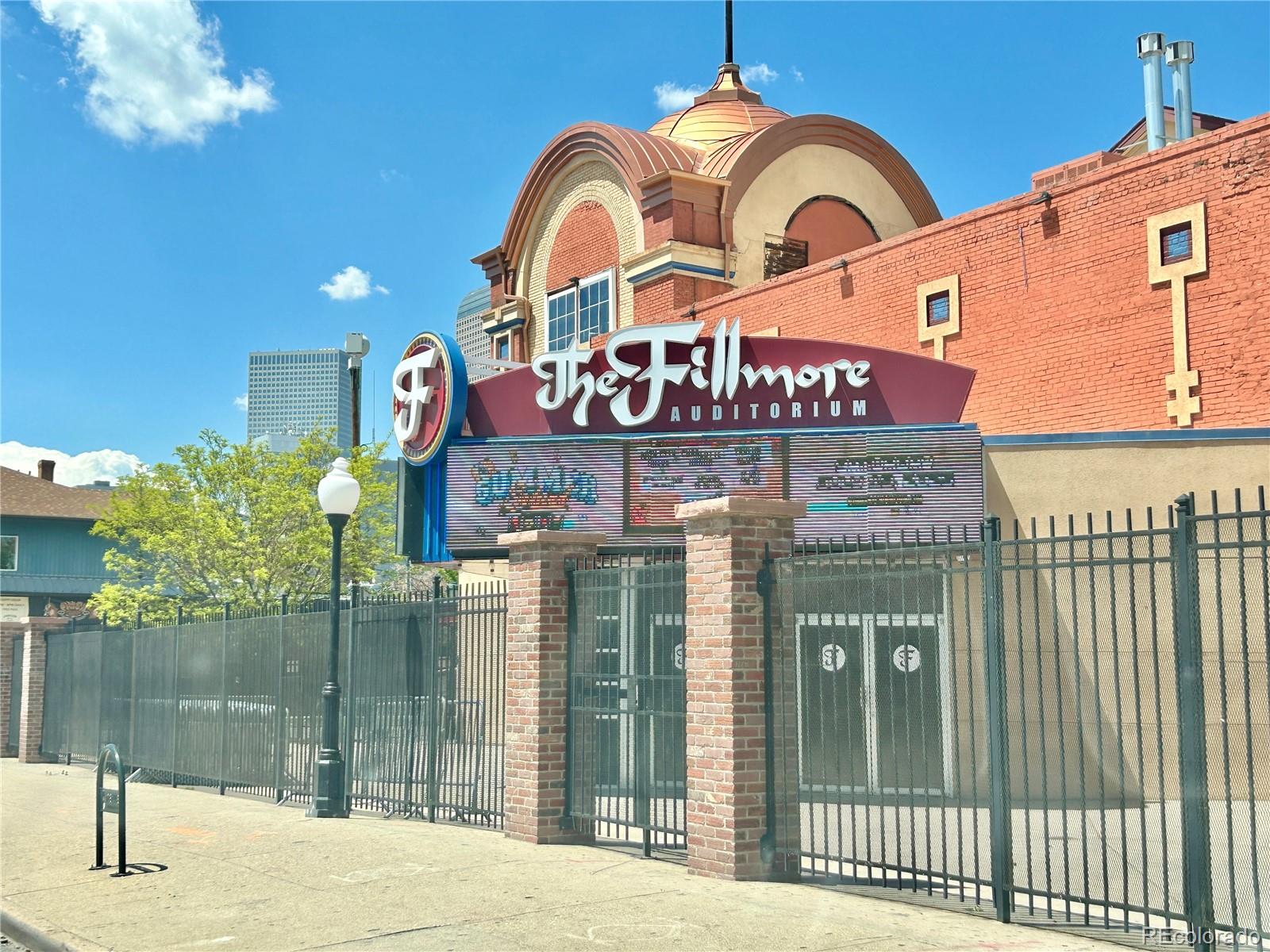16-th 16-th E 16th Denver, CO 80203 - Photo 37 of 38 a front view of a house with a iron gate